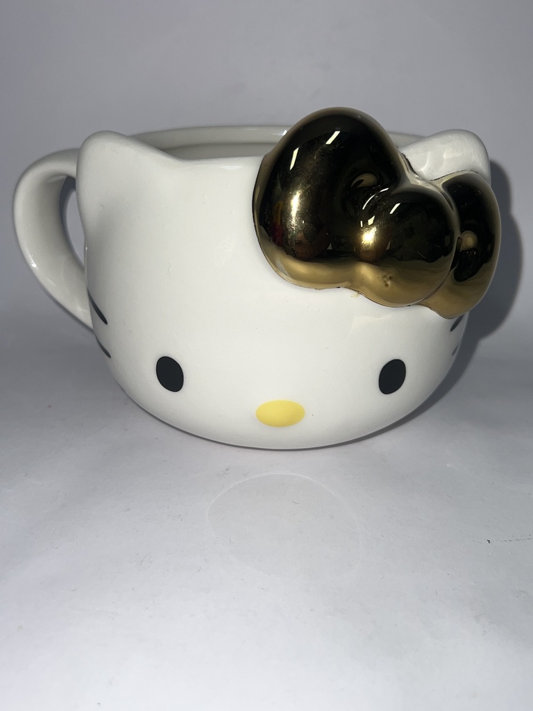 TAZA CARA HELLO KITTY LAZO DORADO